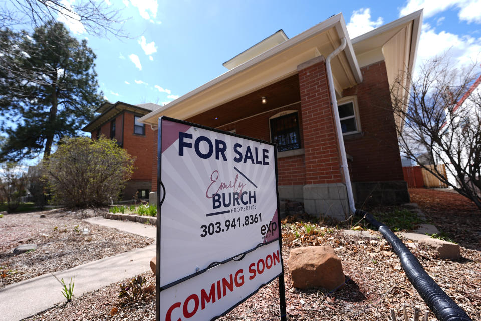 A for sale sign stands outside a home on Wednesday, April 3, 2024, in Denver. Holding out for more attractive mortgage rates could give homebuyers some financial breathing room. (AP Photo/David Zalubowski)