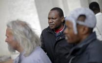 Homeless people wait to enter the Vatican March 26, 2015. REUTERS/Max Rossi