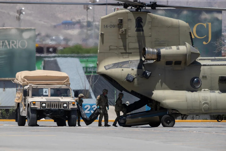 U.S. Army soldiers and Mexican troops participate in binational military joint exercises, focusing on response to a supposed earthquake in which multiple scenarios played out, including the collapse of a soccer stadium, a derailment of a train, a collapse of the local airport and a rupture of a water treatment plant on June 25, 2024. In this photo, joint troops load "dummies" onto a U.S. aircraft at Benito Juárez Olympic Stadium in Ciudad Juárez.