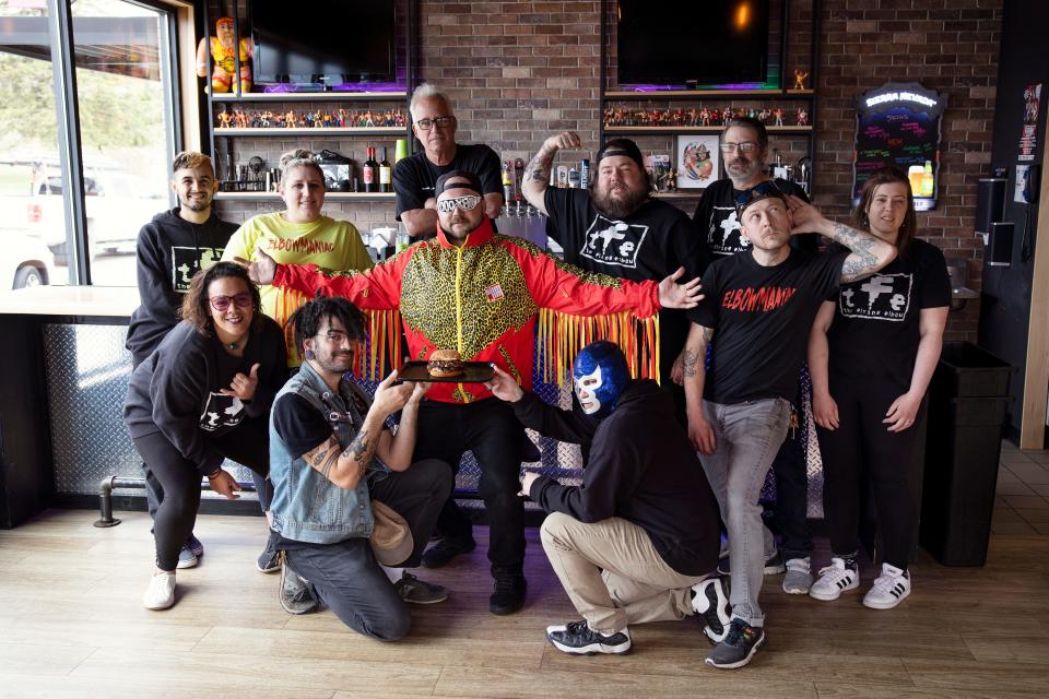 Staff at the Flying Elbow, 229 N. 13th Street, Marshalltown, which won the 2022 Iowa's Best Burger contest with a stacked smashburger.