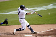 Detroit Tigers' Robbie Grossman connects for an RBI single during the second inning of a baseball game against the Kansas City Royals, Thursday, May 13, 2021, in Detroit. (AP Photo/Carlos Osorio)