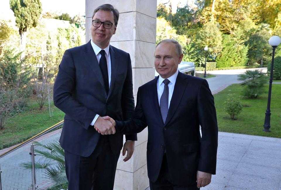 Russian President Vladimir Putin, right, and Serbian President Aleksandar Vucic pose for a photo during their meeting in the Bocharov Ruchei residence in the Black Sea resort of Sochi, Russia, Wednesday, Dec. 4, 2019.(Mikhail Klimentyev, Sputnik, Kremlin Pool Photo via AP)