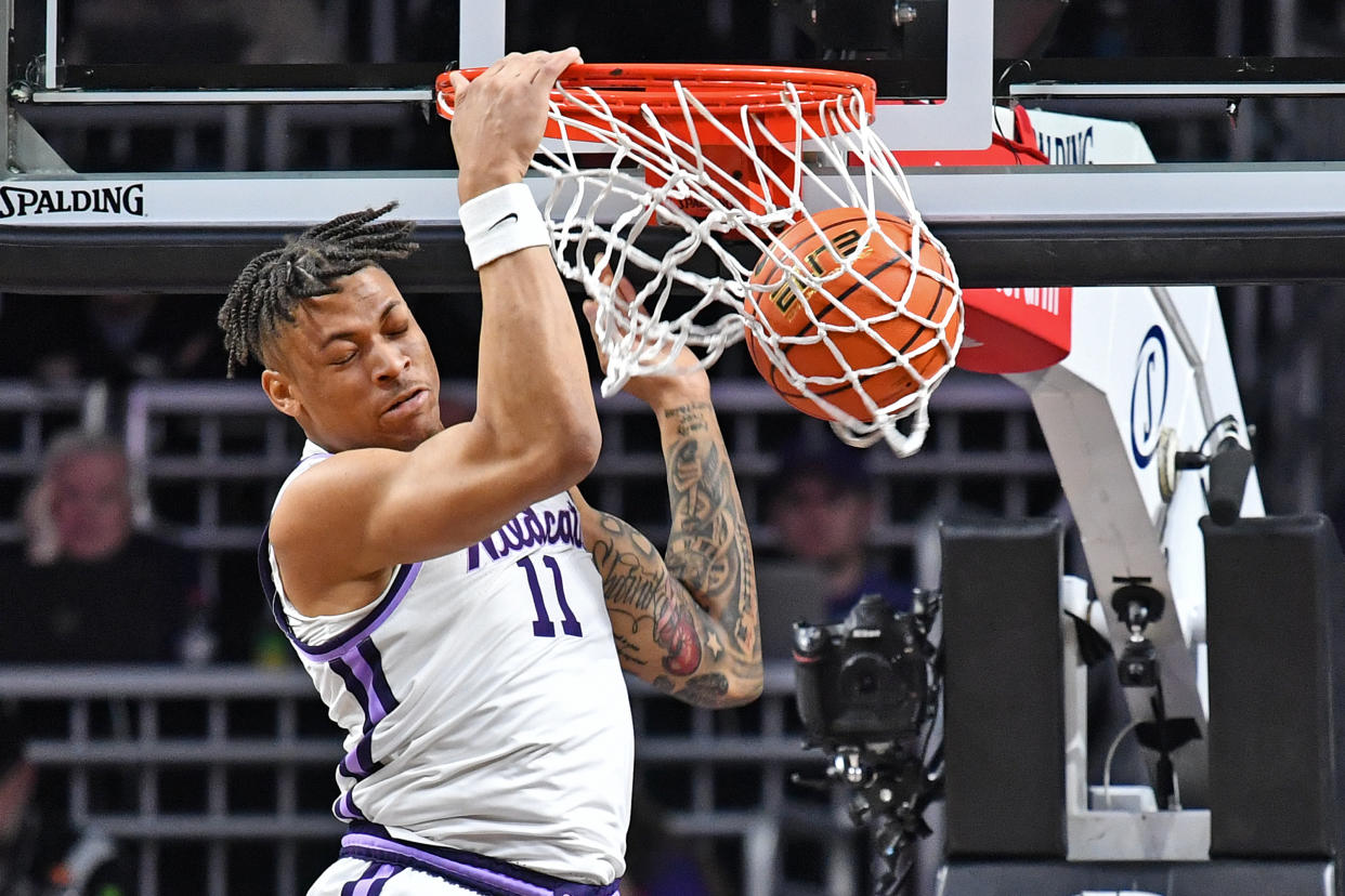 MANHATTAN, KS - FEBRUARY 21:  Keyontae Johnson #11 of the Kansas State Wildcats dunks the ball in the first half of a game against the Baylor Bears at Bramlage Coliseum on February 21, 2023 in Manhattan, Kansas.  (Photo by Peter Aiken/Getty Images)