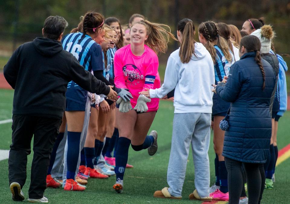 Franklin High School girls soccer goal keeper captain senior Rachel Welch during introductions before the MIAA Div. 1 Round of 32 playoff game against Westford Academy senior captain Sarah Kirby, Nov. 6, 2023.