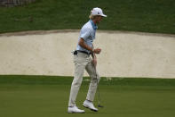 Will Zalatoris punches the air after his putt on the 10th green during the third round of the Masters golf tournament on Saturday, April 10, 2021, in Augusta, Ga. (AP Photo/Gregory Bull)