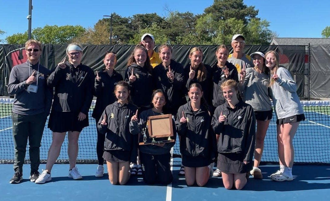 The Zeeland East girls tennis team claimed the OK Green Conference title on Friday.