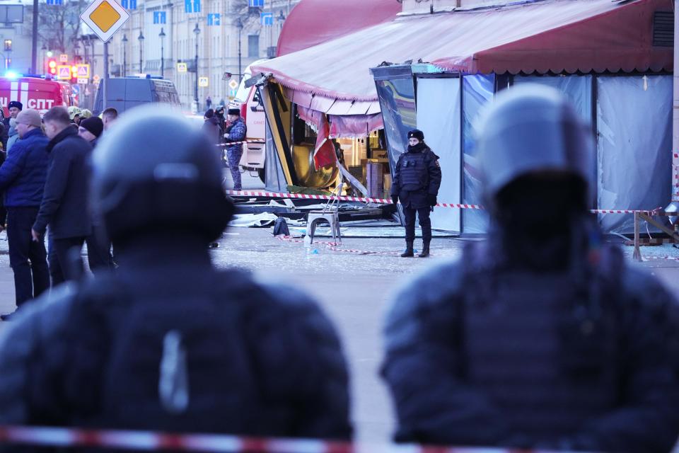 An explosion tore through a cafe in the Russian city of St. Petersburg on Sunday, and preliminary reports suggested a prominent military blogger was killed and more than a dozen people were injured. (AP Photo) (AP)