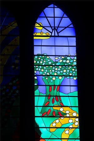 The Queen's Window, a new stained glass window designed by British artist David Hockney, can be seen at Westminster Abbey in London, Britain, September 26, 2018. Victoria Jones/Pool via REUTERS