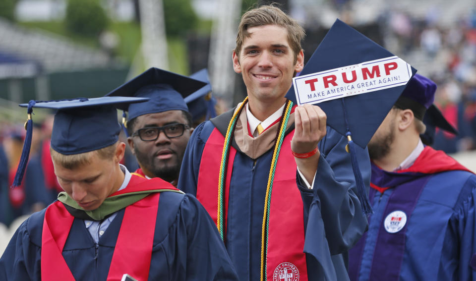 Liberty University student David Westcott Jr. displays a "Make America great again" sticker on his mortarboard during the&nbsp;May 2017 commencement. (Photo: Steve Helber / ASSOCIATED PRESS)