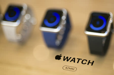 An Apple Watch logo is seen on a display at an Apple Store in Berlin April 10, 2015. REUTERS/Stefanie Loos