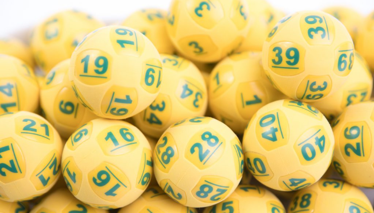 Oz Lotto balls shown as officials call on $50 million division one winner to come forward.