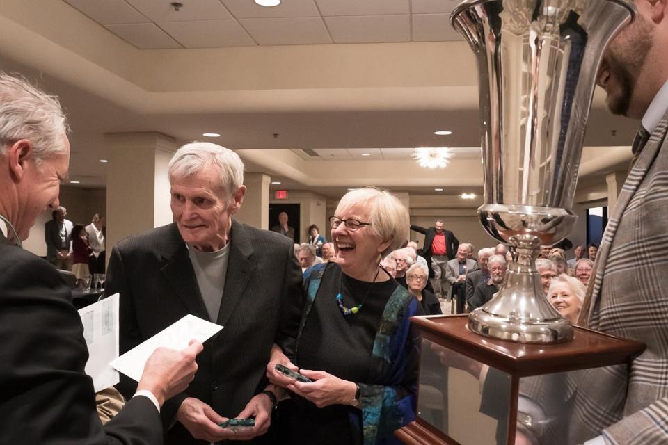 George Ellison and Janet McCue accept the Thomas Wolfe Memorial Award in 2019 for the book "Back of Beyond: A Horace Kephart Biography."