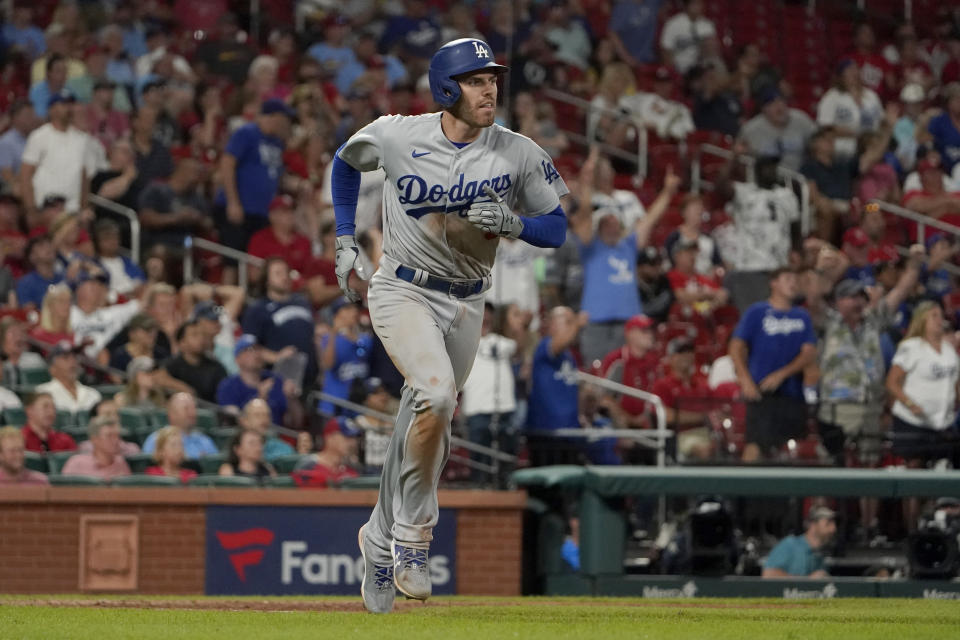 Los Angeles Dodgers' Freddie Freeman rounds the bases after hitting a solo home run during the ninth inning of a baseball game against the St. Louis Cardinals Tuesday, July 12, 2022, in St. Louis. (AP Photo/Jeff Roberson)