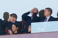 <p>Prince George was Prince William's mini-me at a match between Aston Villa and Nottingham Forest. George is a big fan of Villa.</p>