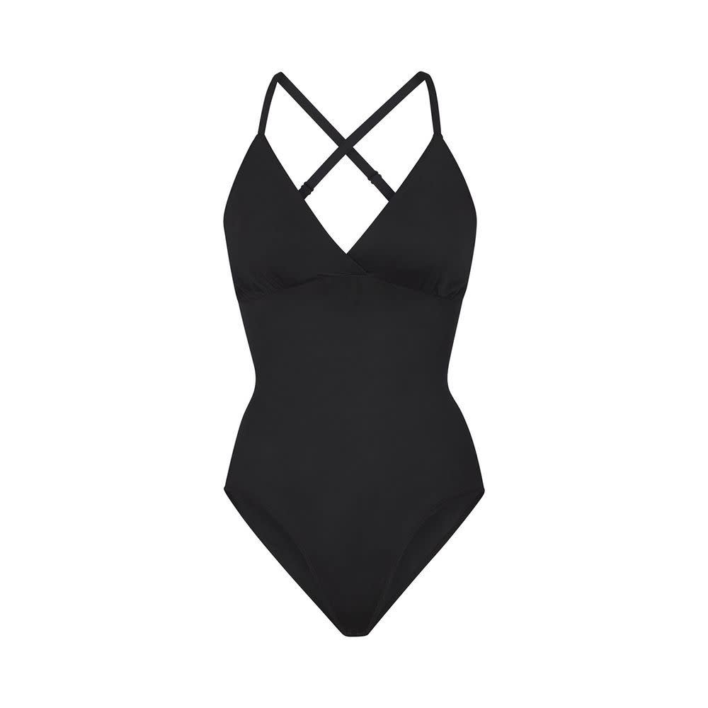 <p><a href="https://clicks.trx-hub.com/xid/hearstcorp_9eb67_ell?q=https%3A%2F%2Fskims.com%2Fproducts%2Fbarely-there-bodysuit-brief-w-snaps-onyx%3Fvariant%3D40074085236868%26glCountry%3DUS%26glCurrency%3DUSD%26gclid%3DCjwKCAjw5_GmBhBIEiwA5QSMxIrvfigQuv6XY7tx-OAIfetQfoaNlSGHO9PDJ0PsrzC13ue835DGpBoCymMQAvD_BwE&p=https%3A%2F%2F&utmSource=yahoo-us&utmCampaign=61&utmMedium=syn" rel="nofollow noopener" target="_blank" data-ylk="slk:Shop Now;elm:context_link;itc:0;sec:content-canvas" class="link rapid-noclick-resp">Shop Now</a></p><p>Bodysuit Brief with Snaps</p><p>skims.com</p><p>$62.00</p>