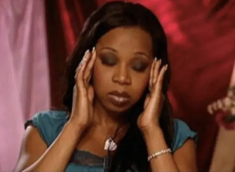 Tiffany "New York" Pollard rubbing her head in stress in a scene from "Flavor of Love"