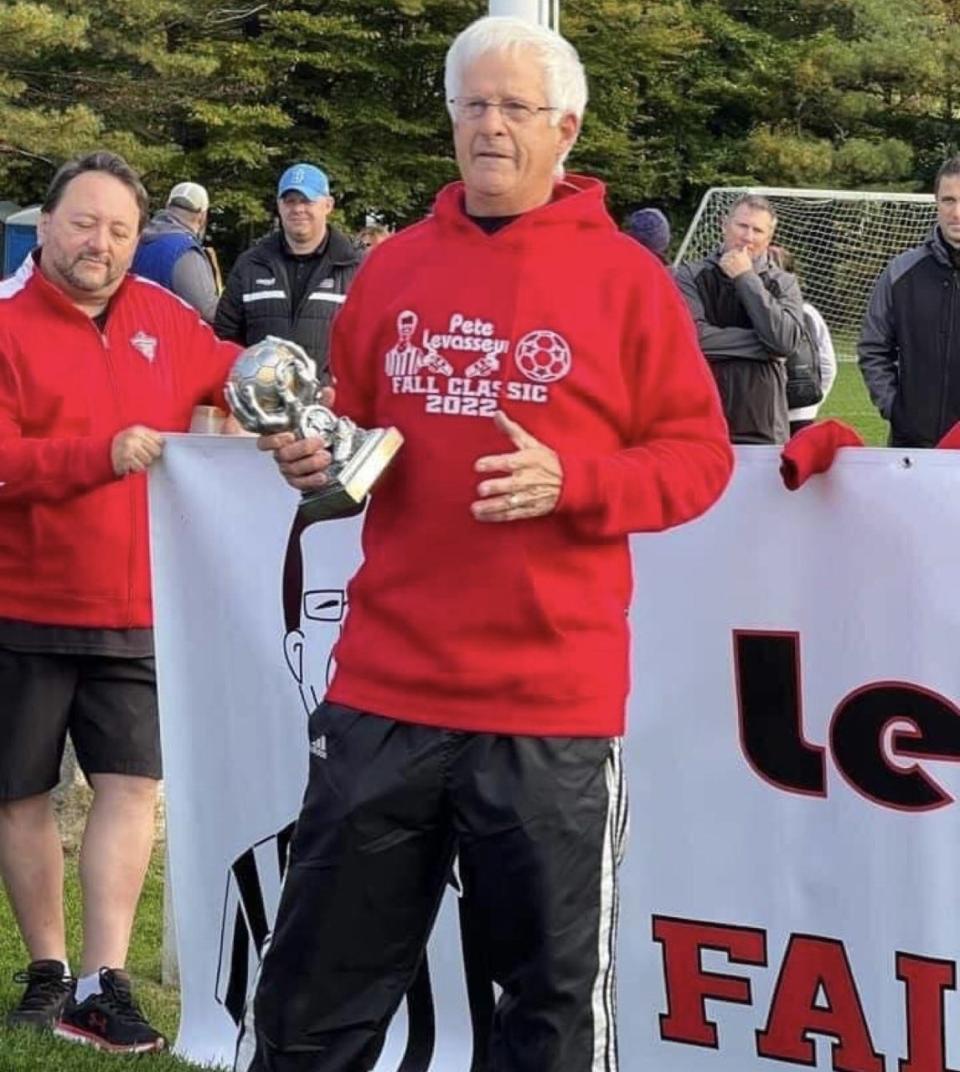 Peter Levasseur speaks during the Sanford Soccer Association's annual regional tournament at Shaw's Field in Sanford, Maine, in October of 2022. The association has named the tournament after Levasseur, in recognition of his leadership and commitment to youth soccer over the decades.