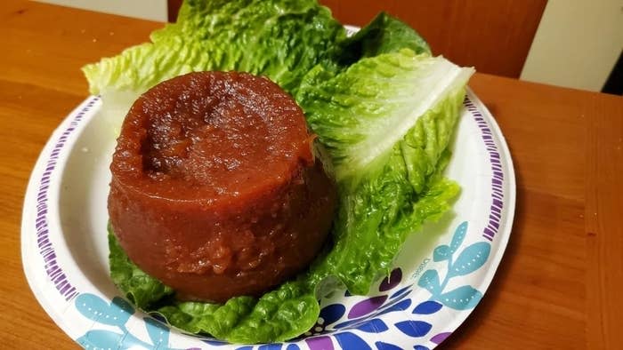 gelatinized barbecue sauce on top of a few leaves of lettuce