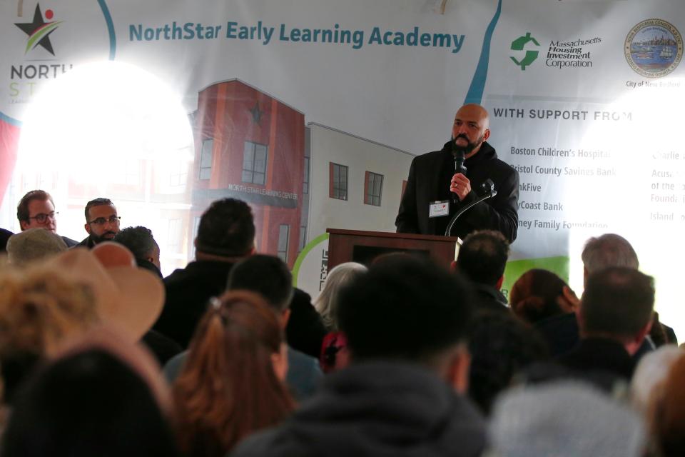 Pastor Marco DeBarros, New Life South Coast, blesses the event at the future NorthStar Learning Academy to be constructed on Rivet Street in New Bedford.