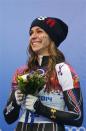 Noelle Pikus-Pace of the U.S. reacts after winning second place in the women's skeleton event at the 2014 Sochi Winter Olympics, at the Sanki Sliding Center in Rosa Khutor February 14, 2014. REUTERS/Murad Sezer