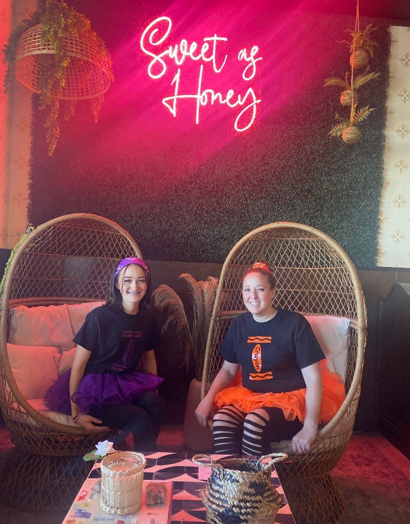 Joy Paul (right) and her daughter Brooklynn work together on BEA-Joyful Boutique, a Facebook group and soon-to-be Shopify store for custom tees (as seen worn here) and tumblers.
