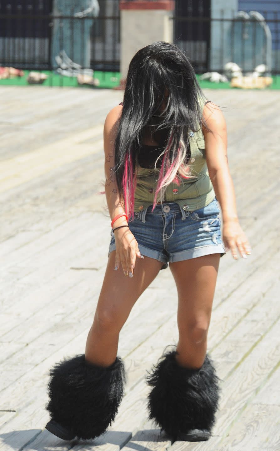 <p>It just may have been Nicole Polizzi (better known as Snooki) from <em>Jersey Shore</em> who made huge furry boots popular—and hopefully they'll never make their way back onto a list of trends again. Not only did they make your feet and legs unnecessarily hot, but they just looked ridiculous! </p>