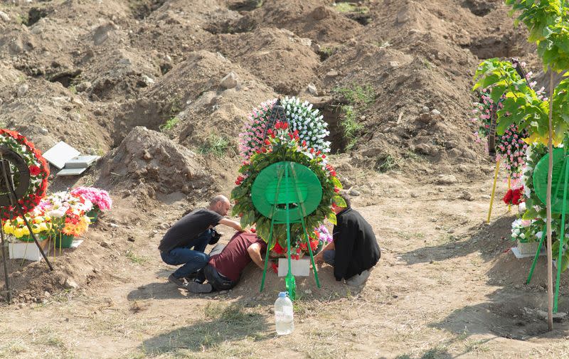 People attend a funeral of Karabakh troops member in Stepanakert