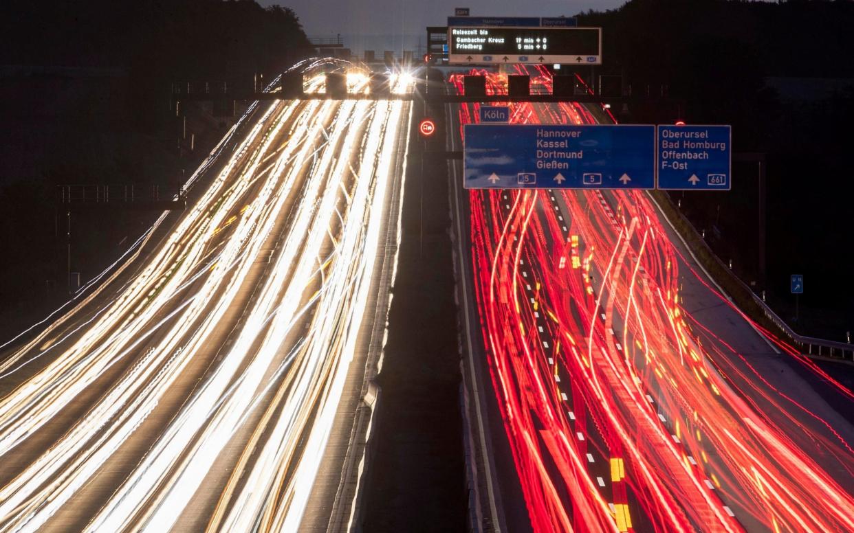 Cars drive on a highway in Frankfurt, Germany - Michael Probst/AP