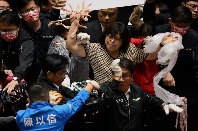 Pork intestines are seen during a scuffle in the parliament in Taipei