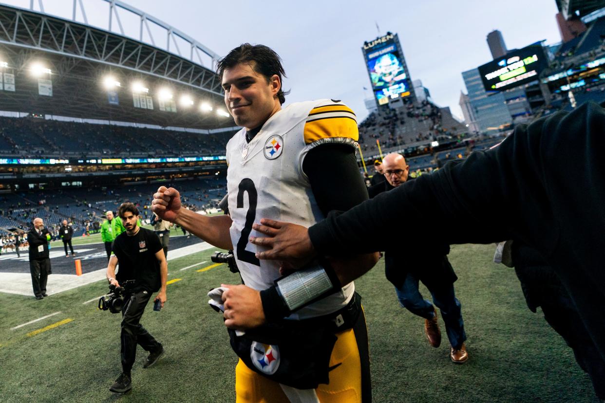 Pittsburgh Steelers quarterback Mason Rudolph pumps his fist as he runs back to the locker room after a 30-23 victory against the Seattle Seahawks in NFL football game Sunday, Dec. 31, 2023, in Seattle. (AP Photo/Lindsey Wasson)