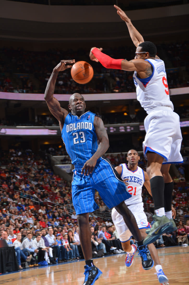 PHILADELPHIA, PA - APRIL 7: Jason Richardson #23 of the Orlando Magic passes the ball against Andre Iguodala #9 of the Philadelphia 76ers on April 7, 2012 at the Wells Fargo Center in Philadelphia, Pennsylvania. NOTE TO USER: User expressly acknowledges and agrees that, by downloading and/or using this Photograph, user is consenting to the terms and conditions of the Getty Images License Agreement. Mandatory Copyright Notice: Copyright 2012 NBAE