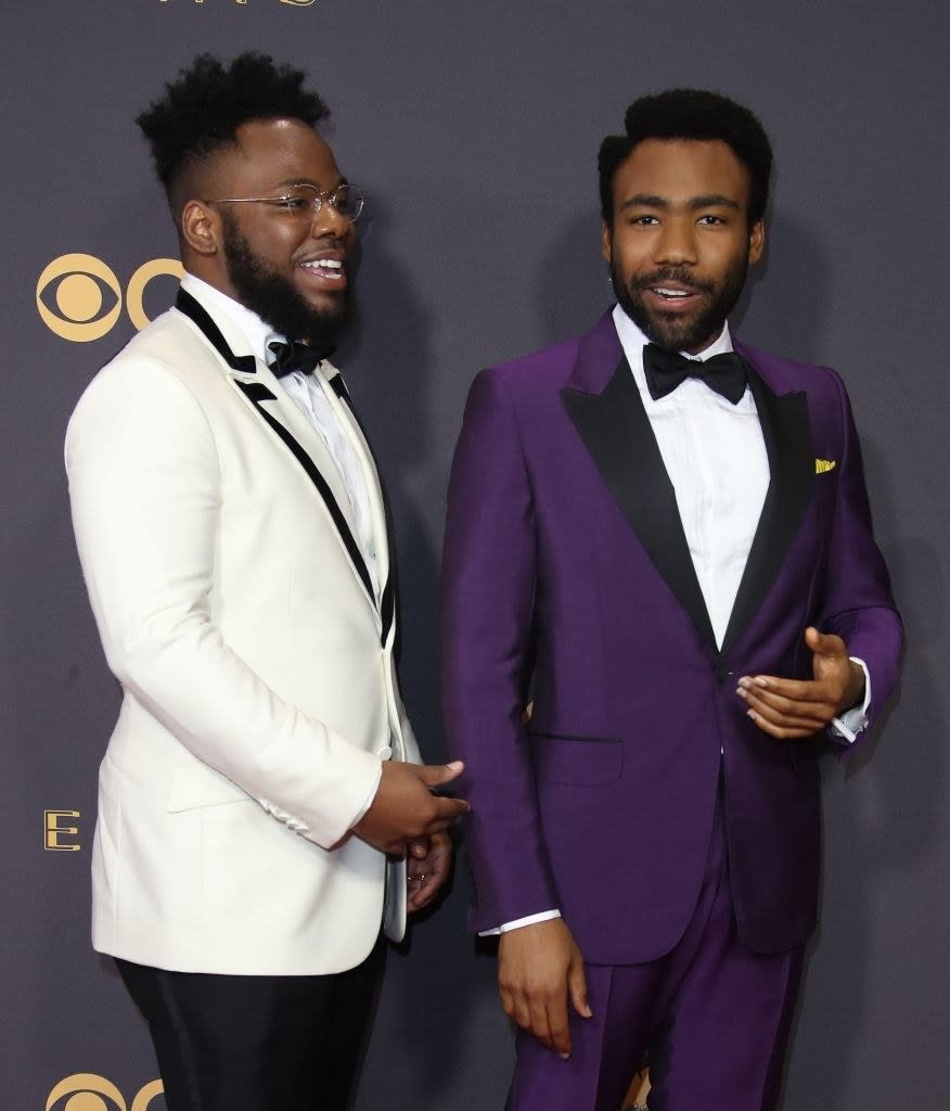 the brothers smiling on the red carpet