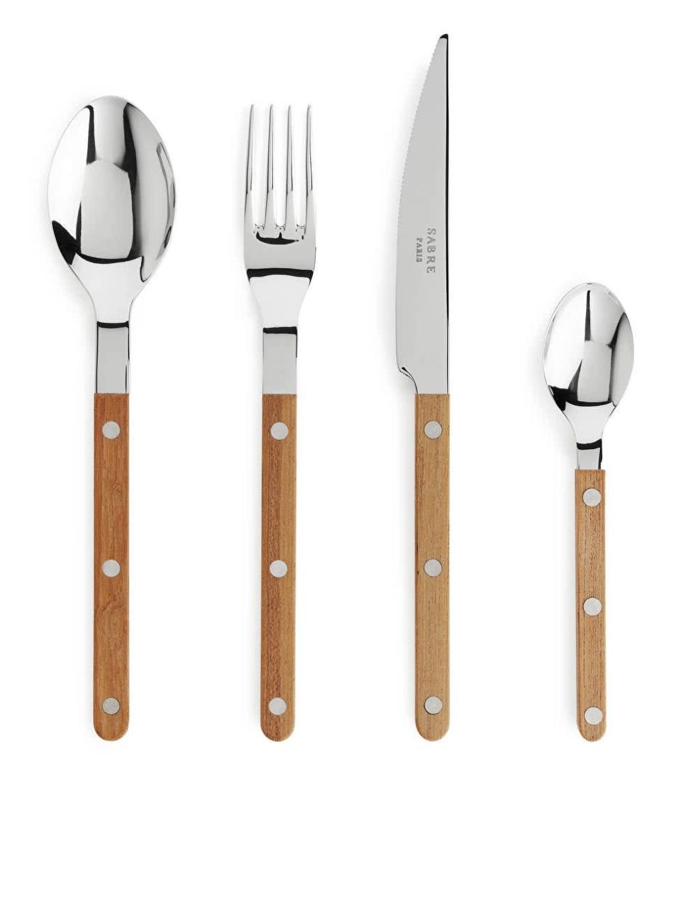<strong>Under £150</strong><br><br>I’ve been ogling this cutlery set trying to add up how much I’d need to spend for a full set. Alas, it’s a lot.<br><br><strong>Arket</strong> Sabre Paris Teak Dinner Cutlery, $, available at <a href="https://www.arket.com/en_gbp/homeware/kitchen/product.sabre-paris-teak-dinner-cutlery-orange.0991287001.html" rel="nofollow noopener" target="_blank" data-ylk="slk:Arket" class="link rapid-noclick-resp">Arket</a>