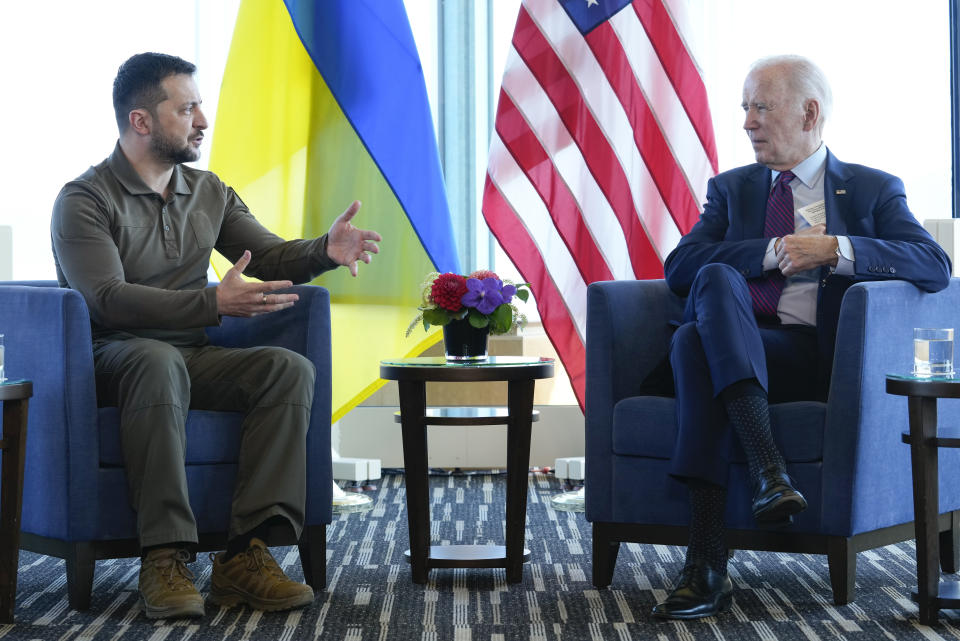 FILE - President Joe Biden, right, meets with Ukrainian President Volodymyr Zelenskyy on the sidelines of the G7 Summit in Hiroshima, Japan, Sunday, May 21, 2023. Biden will spend four days in three nations next week as he travels through Europe tending to alliances that have been tested by Russia's invasion of Ukraine. Biden wants the trip to serve as a showcase for solidarity as Ukraine struggles to repel Russia from its territory with the help of Western weapons. (AP Photo/Susan Walsh, File)