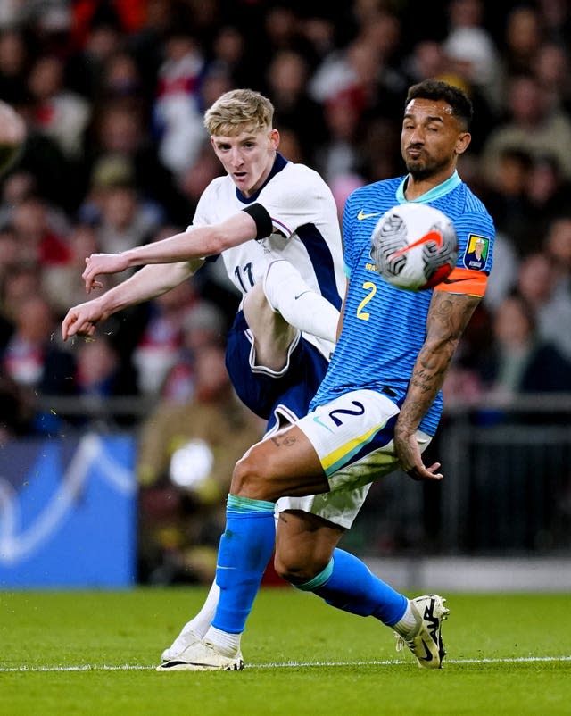 Anthony Gordon, left, takes a shot against Brazil