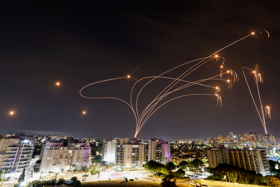 Israel's Iron Dome antimissile system intercepts rockets launched from the Gaza Strip, as seen from Ashkelon, Israel, on Monday.