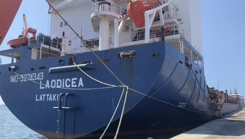 This frame grab from a video provided on Friday, July 29, 2022, shows a Syrian cargo ship Laodicea docked at a seaport, in Tripoli, north Lebanon. Lebanon appeared Friday to reject claims by the Ukrainian Embassy in Beirut that a Syrian ship docked in a Lebanese port is carrying Ukrainian grain stolen by Russia, following an inspection by Lebanese customs officials. (AP Photo)