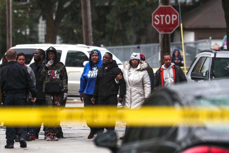 Emotions run high as Carlton Harris, center, the father of missing 3-year-old Major Harris, learns his son was found dead Thursday afternoon.