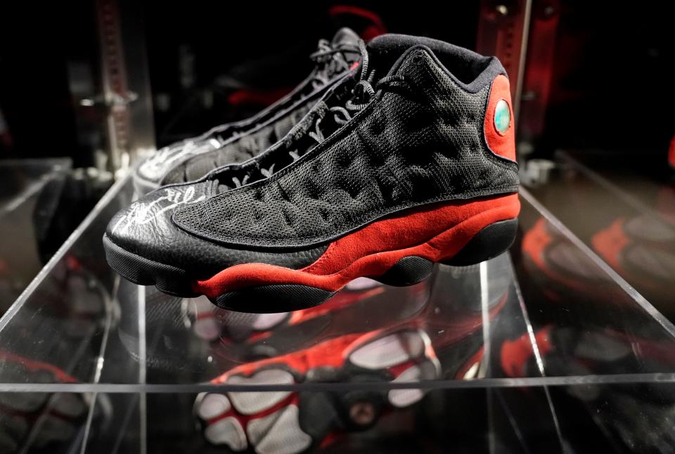 In this file photo taken on April 06, 2023 Michael Jordan’s 1998 NBA Finals Air Jordan XIIIs sneakers are displayed during a press preview  in New York on April 6, 2023 at Sotheby’s for the upcoming auction “Victoriam,”  a special two-part curated collection of sports artifacts.