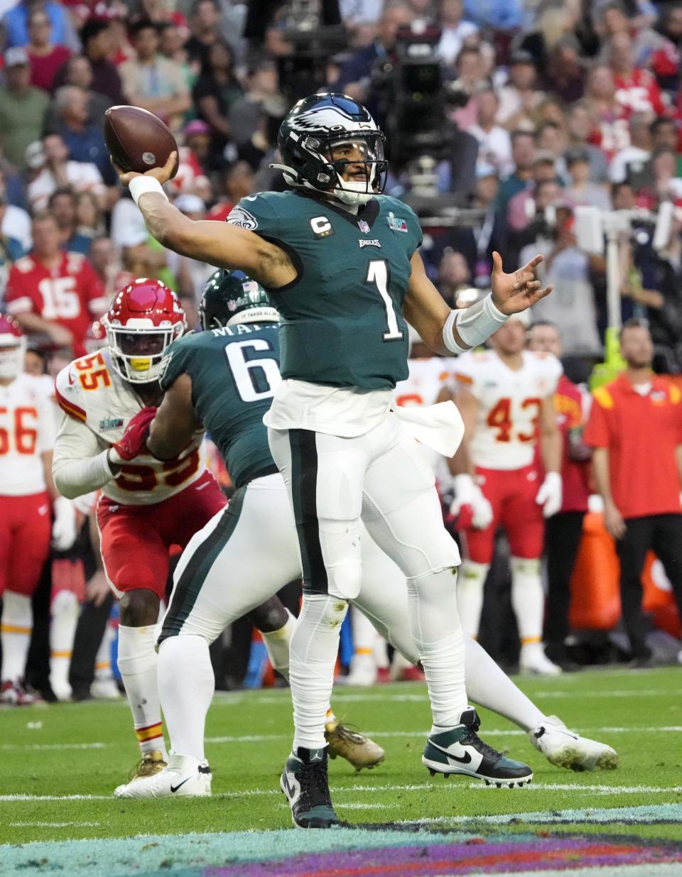 Feb 12, 2023; Glendale, AZ, USA; Philadelphia Eagles quarterback Jalen Hurts (1) throws a pass against the Kansas City Chiefs during the first half in Super Bowl LVII at State Farm Stadium. Mandatory Credit: Michael Chow/The Republic via USA TODAY Sports