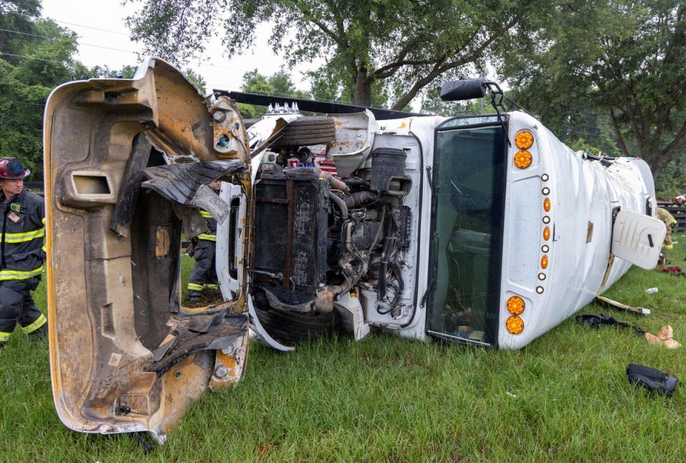 The bus carrying 53 farmworkers that crashed and overturned (AP)