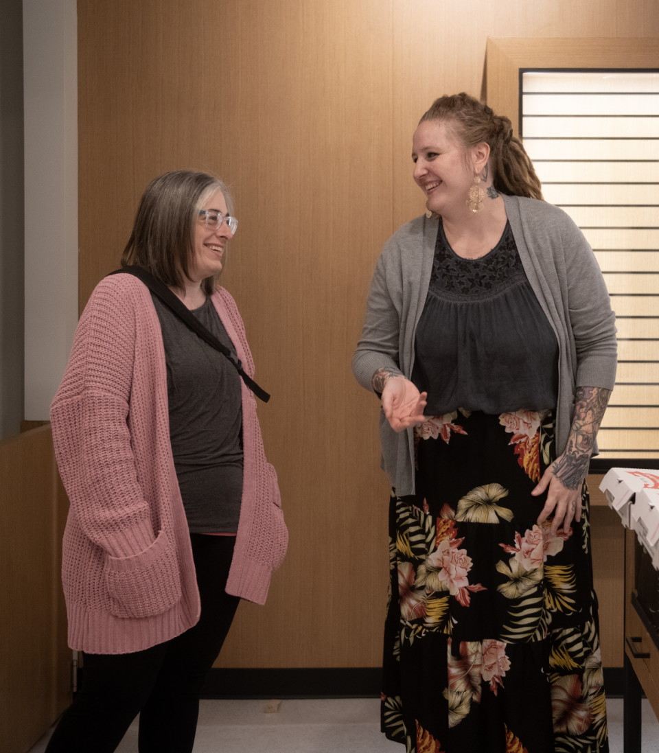 Supergood General Manager Kate Cunningham (right) speaks with Ravenna City Councilwoman Christina West during a meet-and-greet event last week at the medical marijuana dispensary.