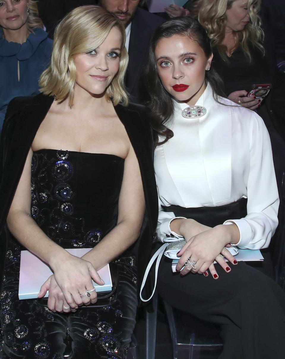 Reese Witherspoon and Bel Powley put their heads together at the Giorgio Armani Prive Haute Couture Spring/Summer 2020 show at Paris Fashion Week on Monday.