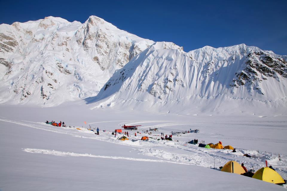 Base Camp on the Kahiltna Glacier in Denali National Park. Mountaineers climbing Denali, the highest mountain in North America, are dropped off here by ski planes, visible in photo.