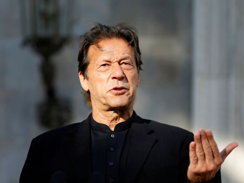 FILE PHOTO: Pakistan's Prime Minister Imran Khan speaks during a joint news conference with Afghan President Ashraf Ghani at the presidential palace in Kabul