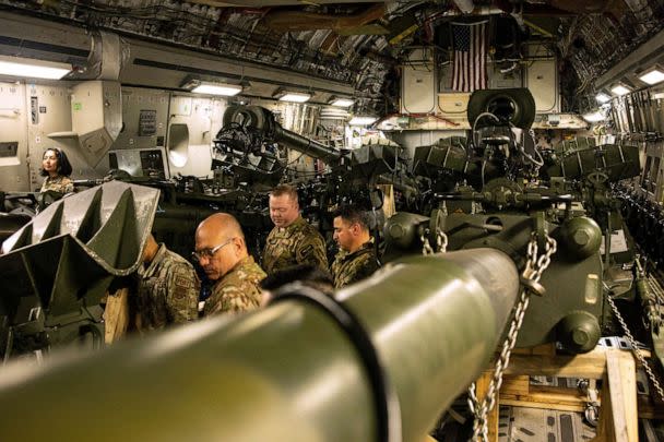 PHOTO: U.S. Marines load an M777 towed 155 mm howitzer into the cargo hold of a U.S. Air Force C-17 Globemaster III transport plane, to be delivered in Europe for Ukrainian forces, at March Air Reserve Base, California, April 21, 2022. (Cpl. Austin Fraley/U.S. Marines via Reuters)