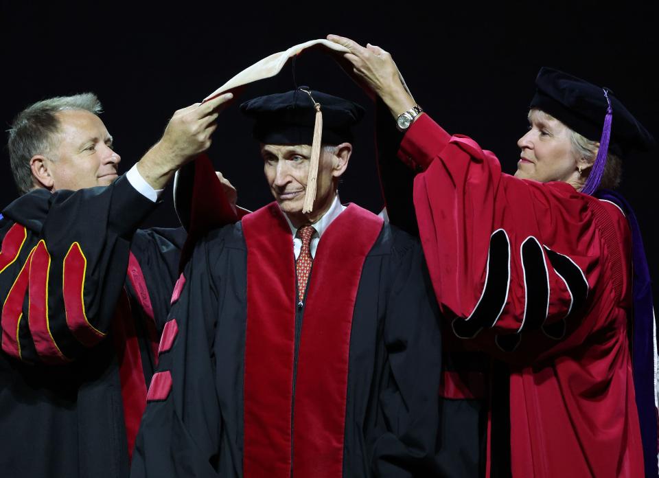 Richard Marriott receives his honorary degree during the University of Utah’s commencement in Salt Lake City on Thursday, May 4, 2023. | Jeffrey D. Allred, Deseret News