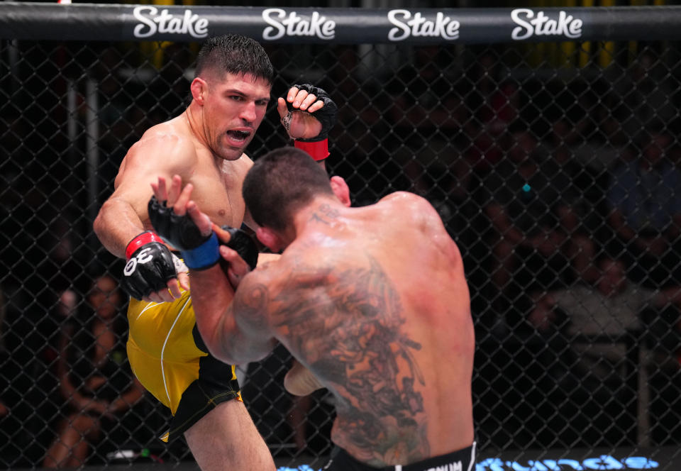 LAS VEGAS, NEVADA - AUGUST 12: (L-R) Vicente Luque kicks Rafael Dos Anjos of Brazil in a welterweight fight during the UFC Fight Night event at UFC APEX on August 12, 2023 in Las Vegas, Nevada. (Photo by Al Powers/Zuffa LLC via Getty Images)