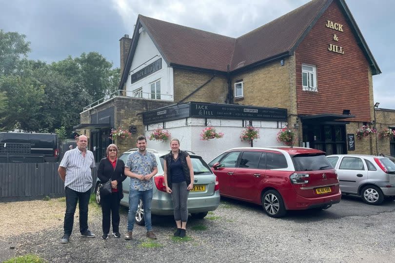 Barry Killick with Councillor Moira Butt, Elliot Colburn MP and the former landlord of the Jack and Jill