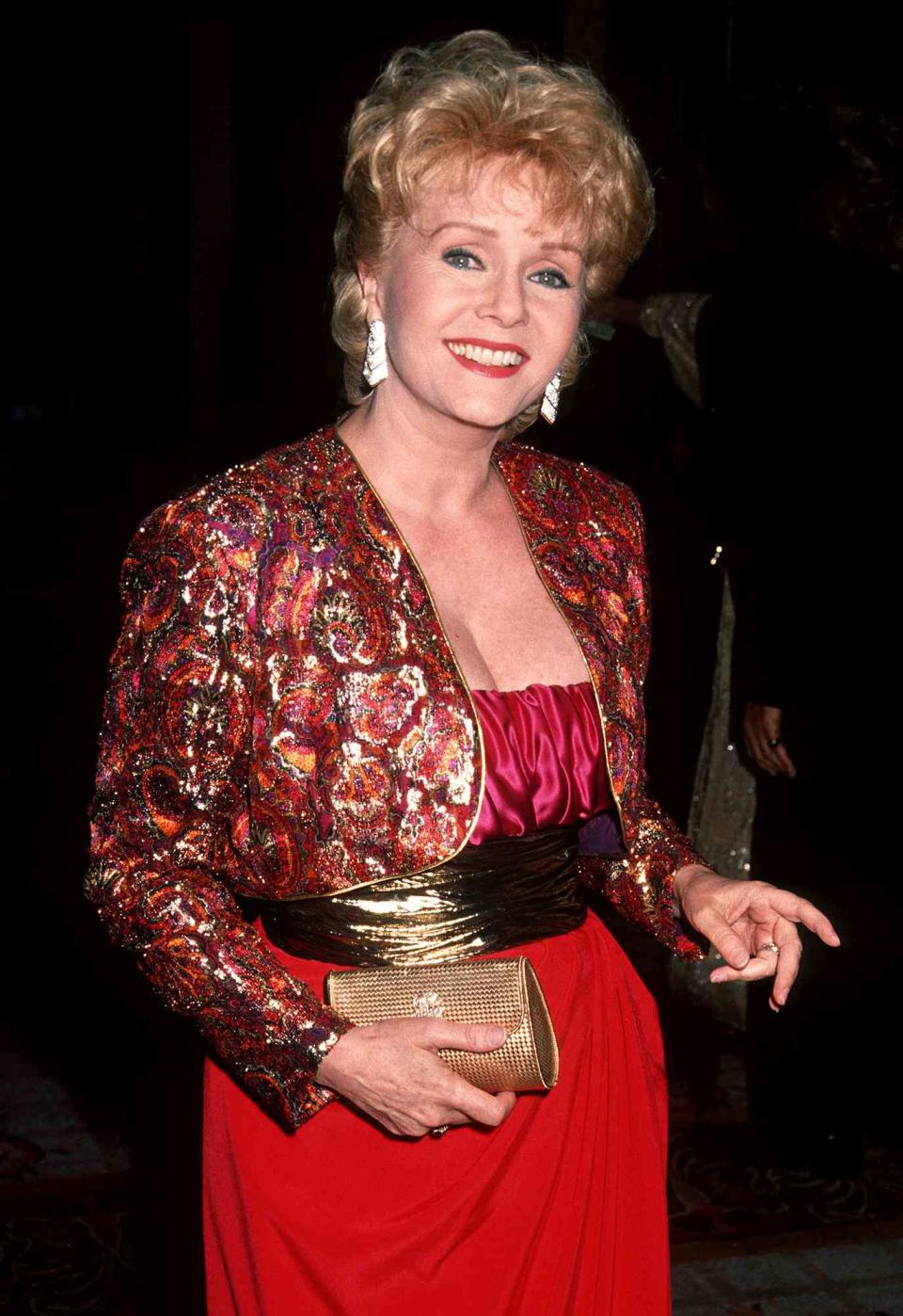 <p>Known for her standout performances in <em>Singin' in the Rain</em>, <em>The Unsinkable Molly Brown </em>and <em>In & Out</em>, the late <a href="https://people.com/tag/debbie-reynolds/" rel="nofollow noopener" target="_blank" data-ylk="slk:Hollywood icon;elm:context_link;itc:0;sec:content-canvas" class="link ">Hollywood icon</a> died in 2016 at age 84.</p>